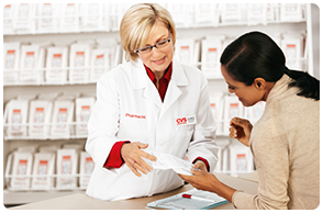 Image of a pharmacist assisting a customer