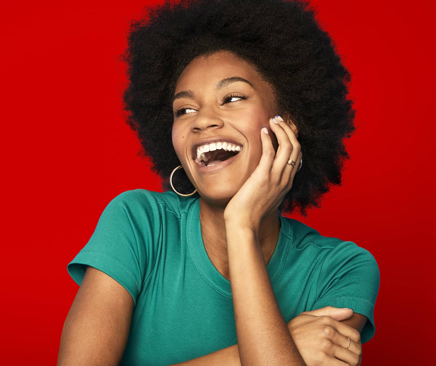 a young Black woman smiling