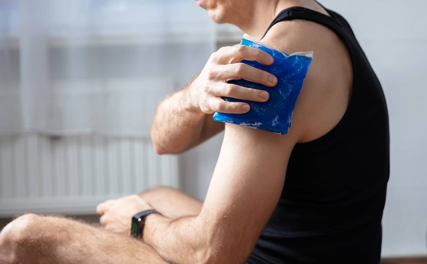 Shop for recovery support products, showing a man holding a gel pack to his upper arm
