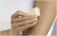 Photo of woman wearing nicotine patch.