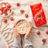 Lindt, Lindor Milk Chocolate Candy Truffles, Chocolates with Smooth, Melting Truffle Center Bag, 5.1 oz, thumbnail image