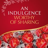 Lindt, Lindor Milk Chocolate Candy Truffles, Chocolates with Smooth, Melting Truffle Center Bag, 5.1 oz, thumbnail image