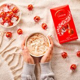 Lindt, Lindor Milk Chocolate Candy Truffles, Chocolate with Melting Truffle Center, 15.2 oz, thumbnail image