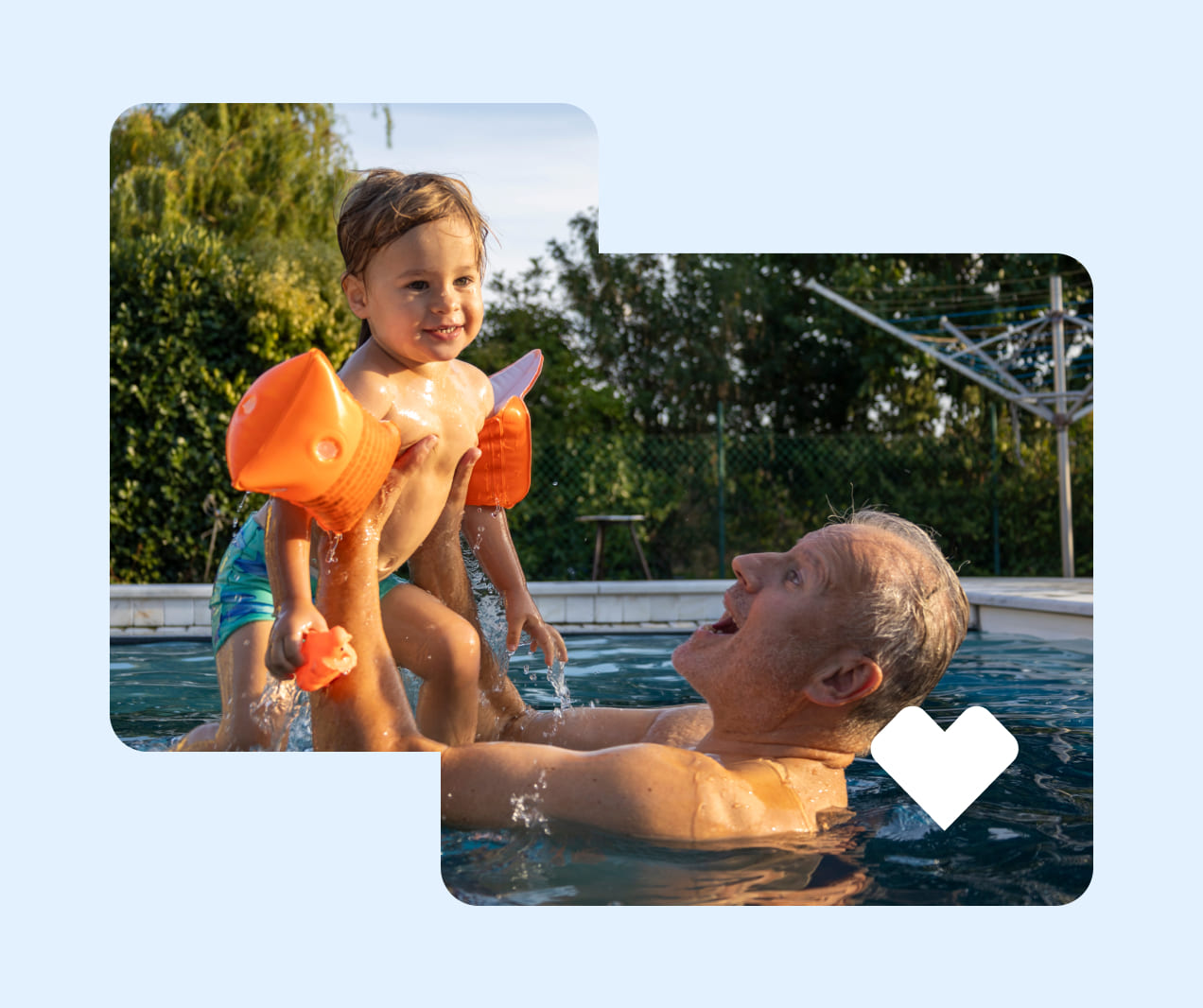 A person picks up their smiling grandchild in a pool.