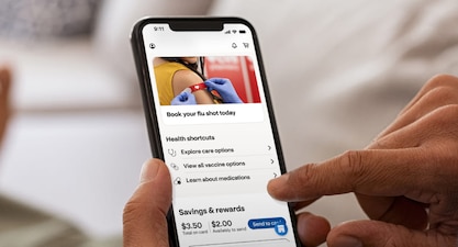 A patient looks up flu shot information online.