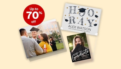A canvas print of a graduate with their parents, a graduation card and a graduation announcement.