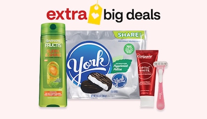 Four products, including a bottle of Garnier Fructis Sleek and Shine shampoo, a bag of York peppermint patties and a tube of Colgate Optic White toothpase.