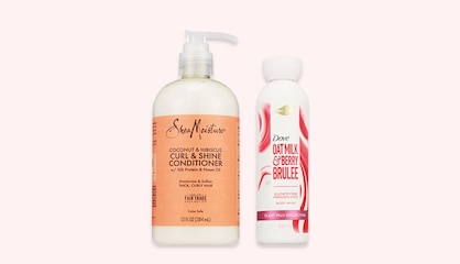 A bottle of Shea Moisture Curl & Shine conditioner and a bottle of Dove body wash.