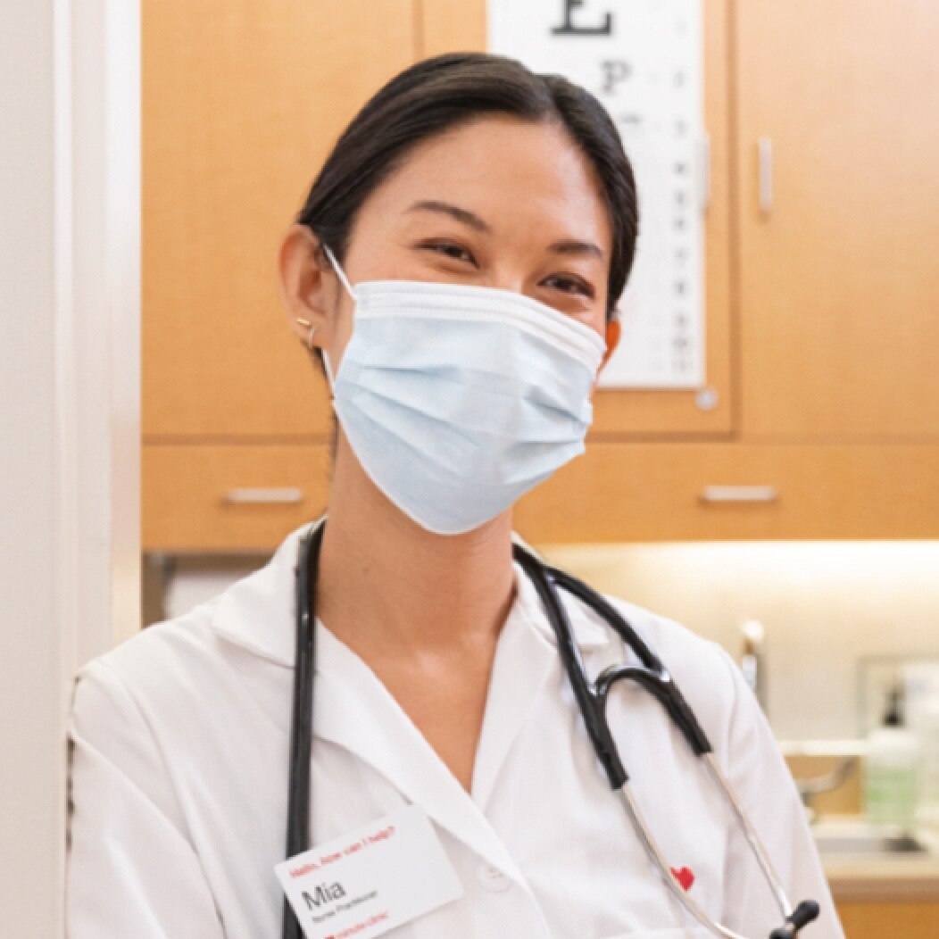 Smiling MinuteClinic nurse in exam room