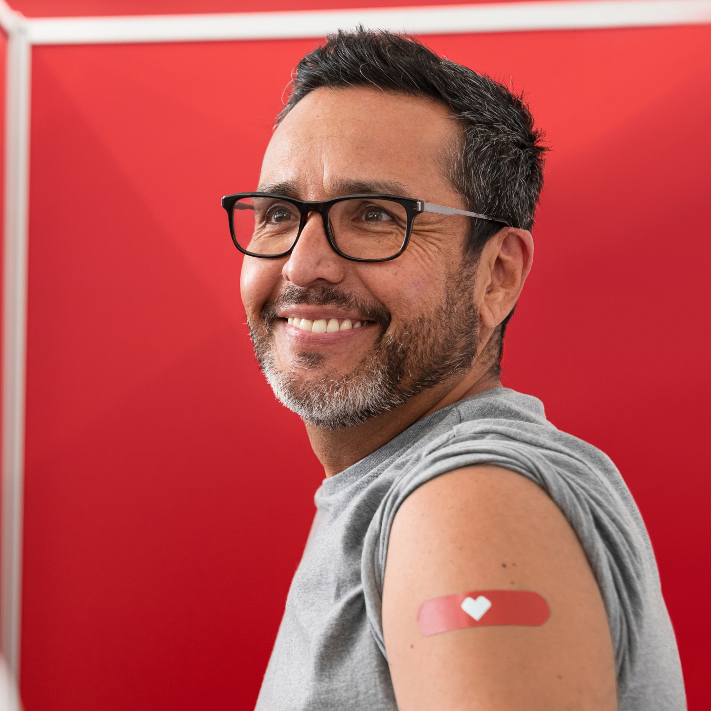 A patient in his 40s receives his vaccination at CVS.