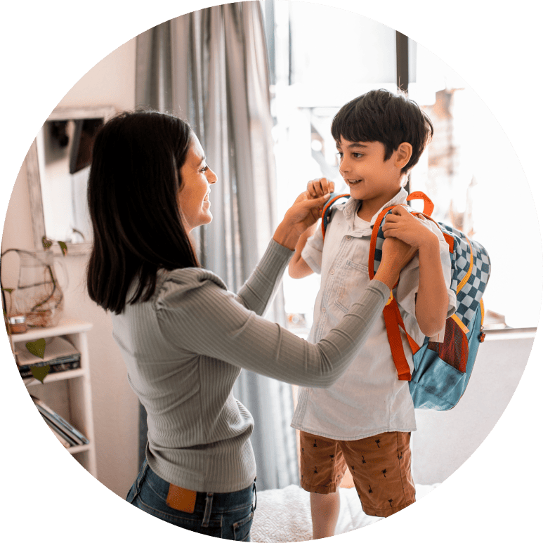 Parent and child laugh as they gear up for the new school year.