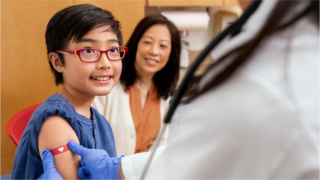 A child gets vaccinated at a CVS MinuteClinic.