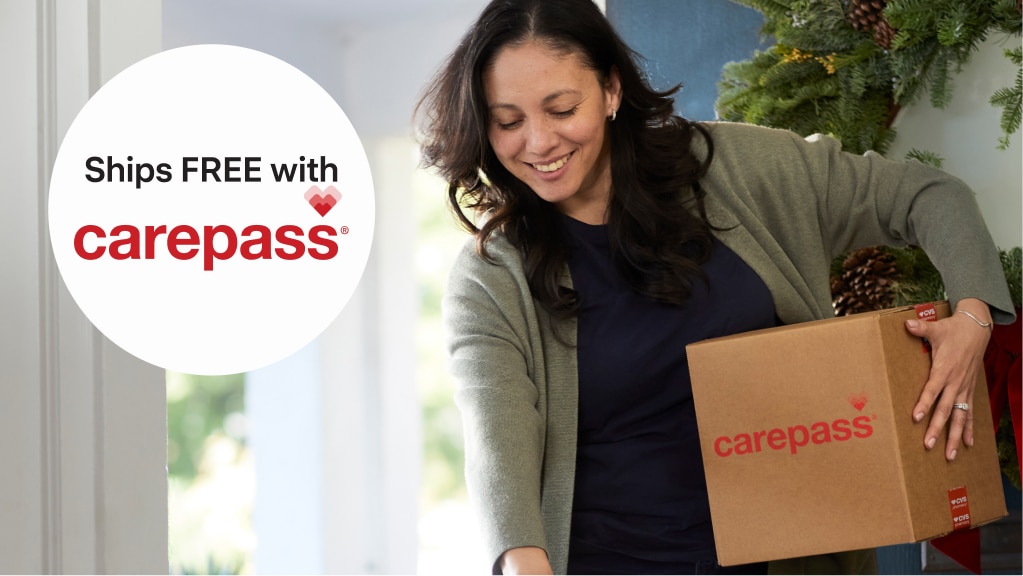 A mother picks up her CarePass delivery.